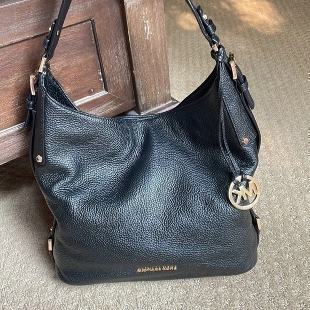 Michael Kors medium leather black with gold hardware shoulder bag purse